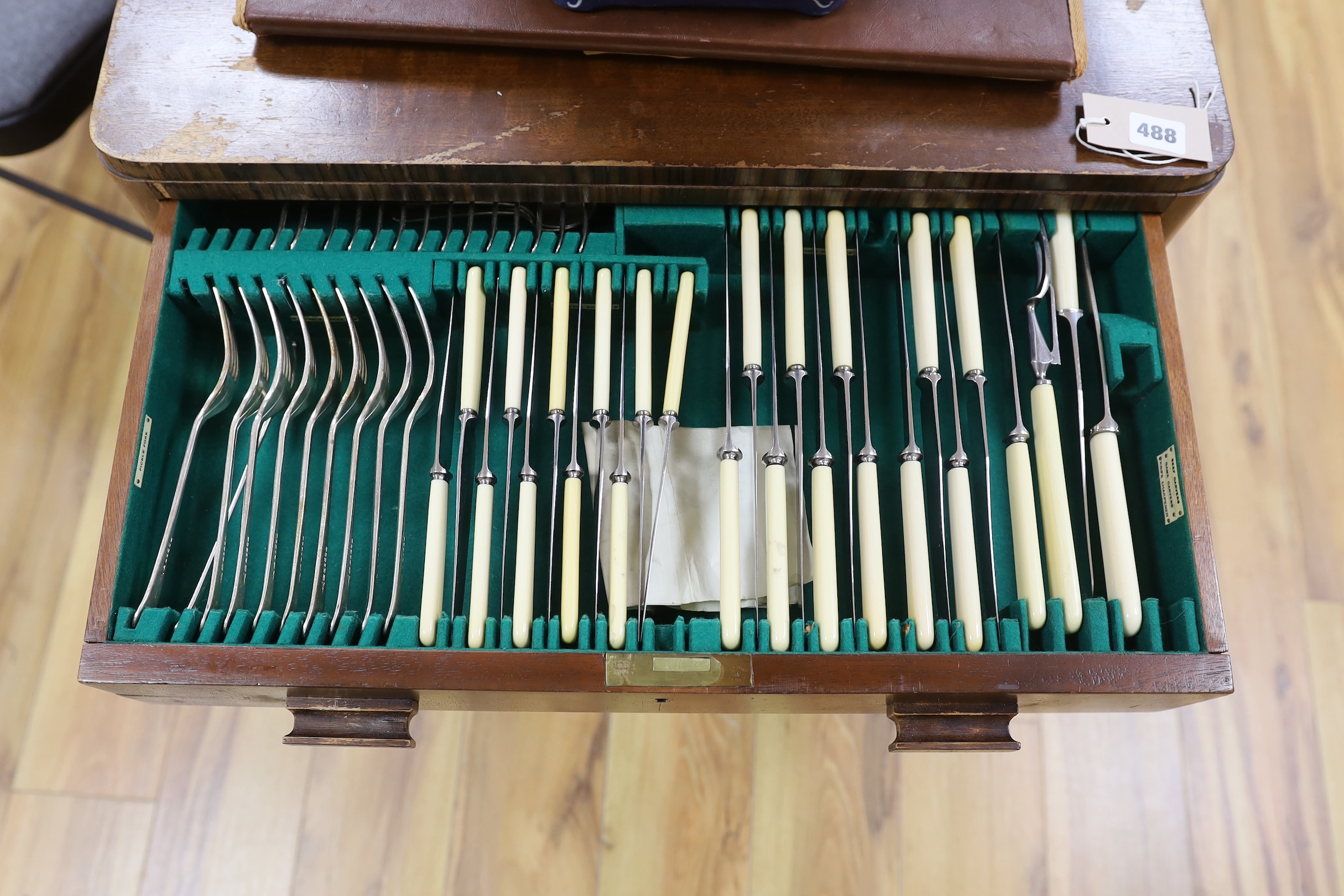 A two drawer canteen of Walker & Hall silver plated cutlery, almost complete, 62cm wide, 77cm high